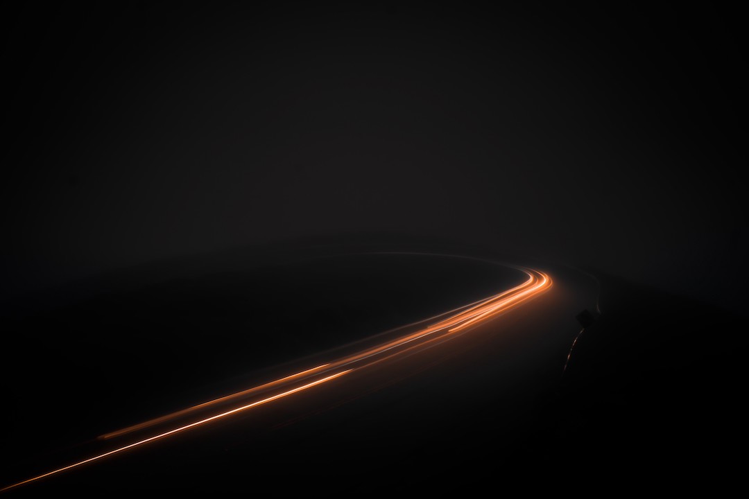 Time-lapse photo of a cars rear lights